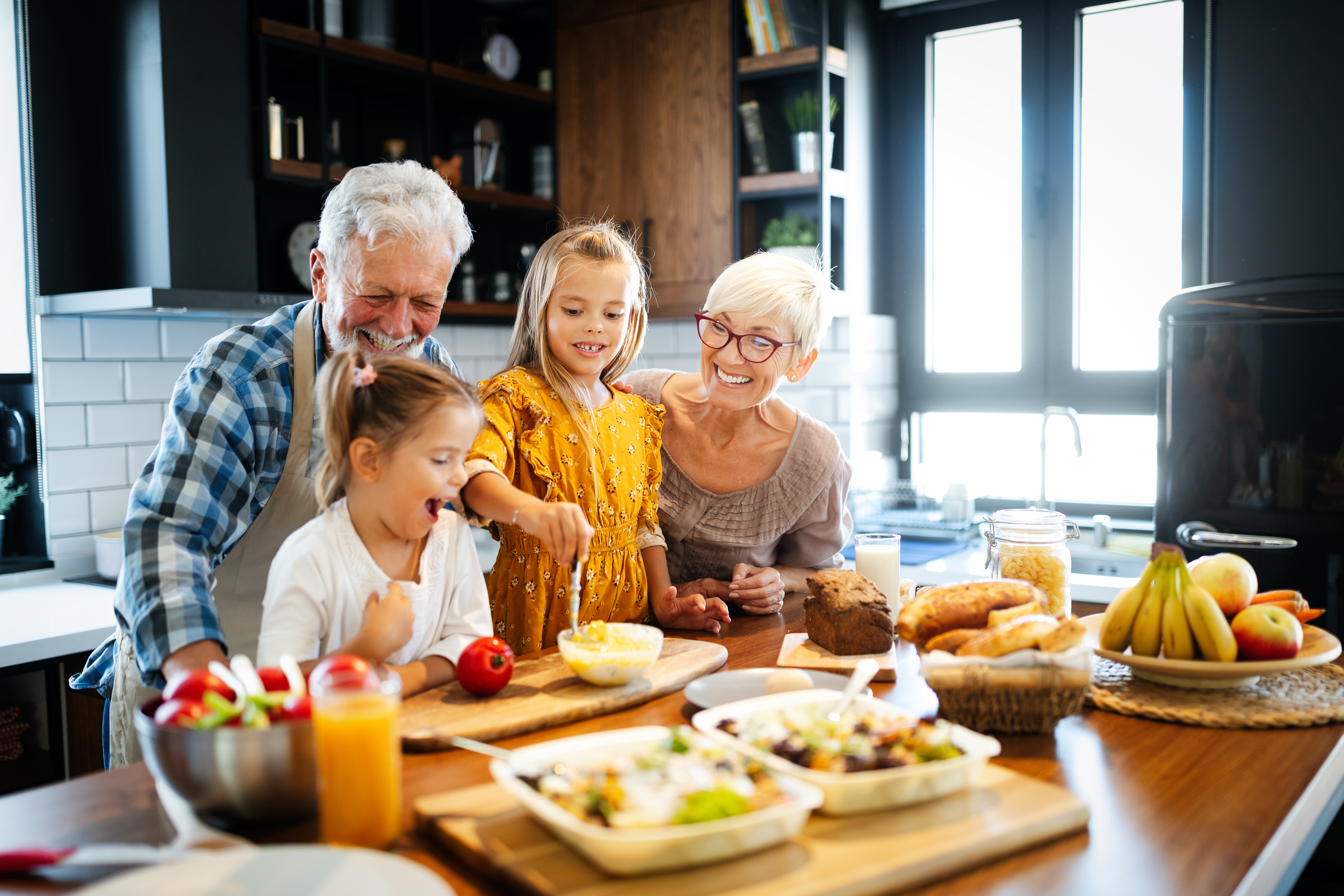 Family enjoying health food in their kitchen